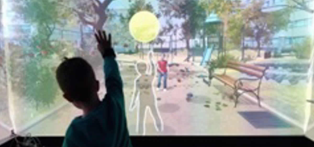 Niño explotando pompas por el método de realidad virtual de diagnóstico de autismo (Foto. Centro de Desarrollo Cognitivo Red Cenit)