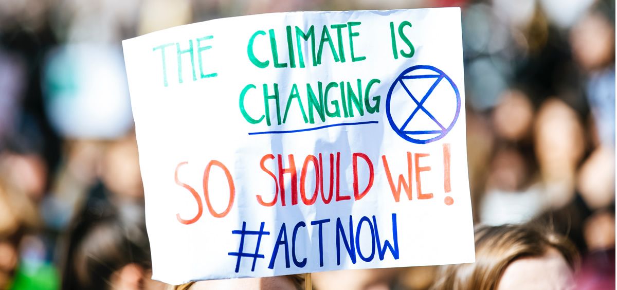 Pancarta denunciando el cambio climático (Foto. Pexels)