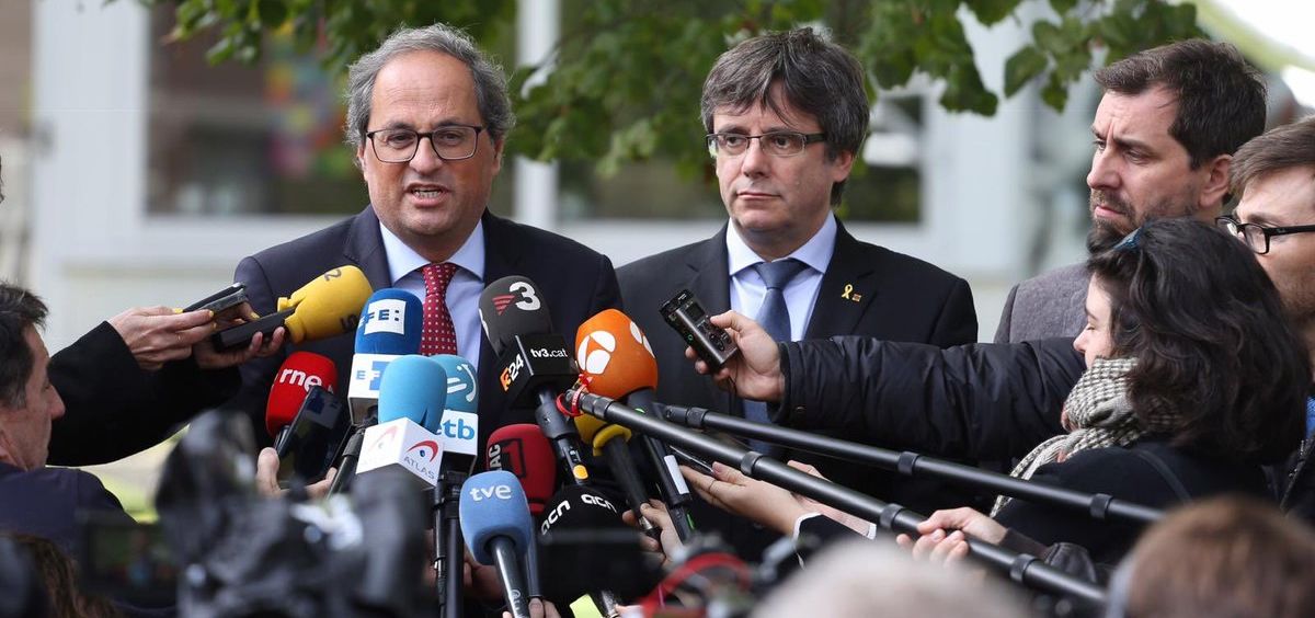 Quim Torra, Carles Puigdemont y Toni Comín, durante la presentación a los medios del Consell de la República